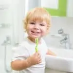 ped boy brushing teeth