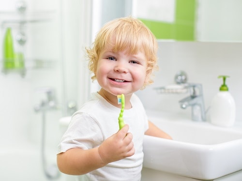 ped boy brushing teeth