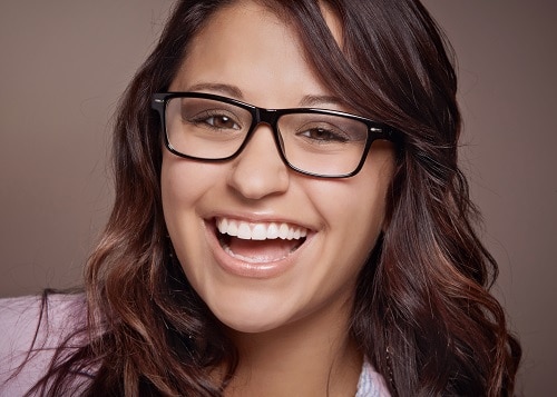 smiling woman with glasses